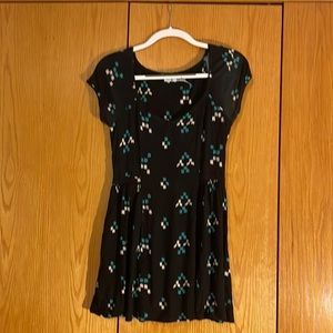 Black patterned mini dress with lace sleeves